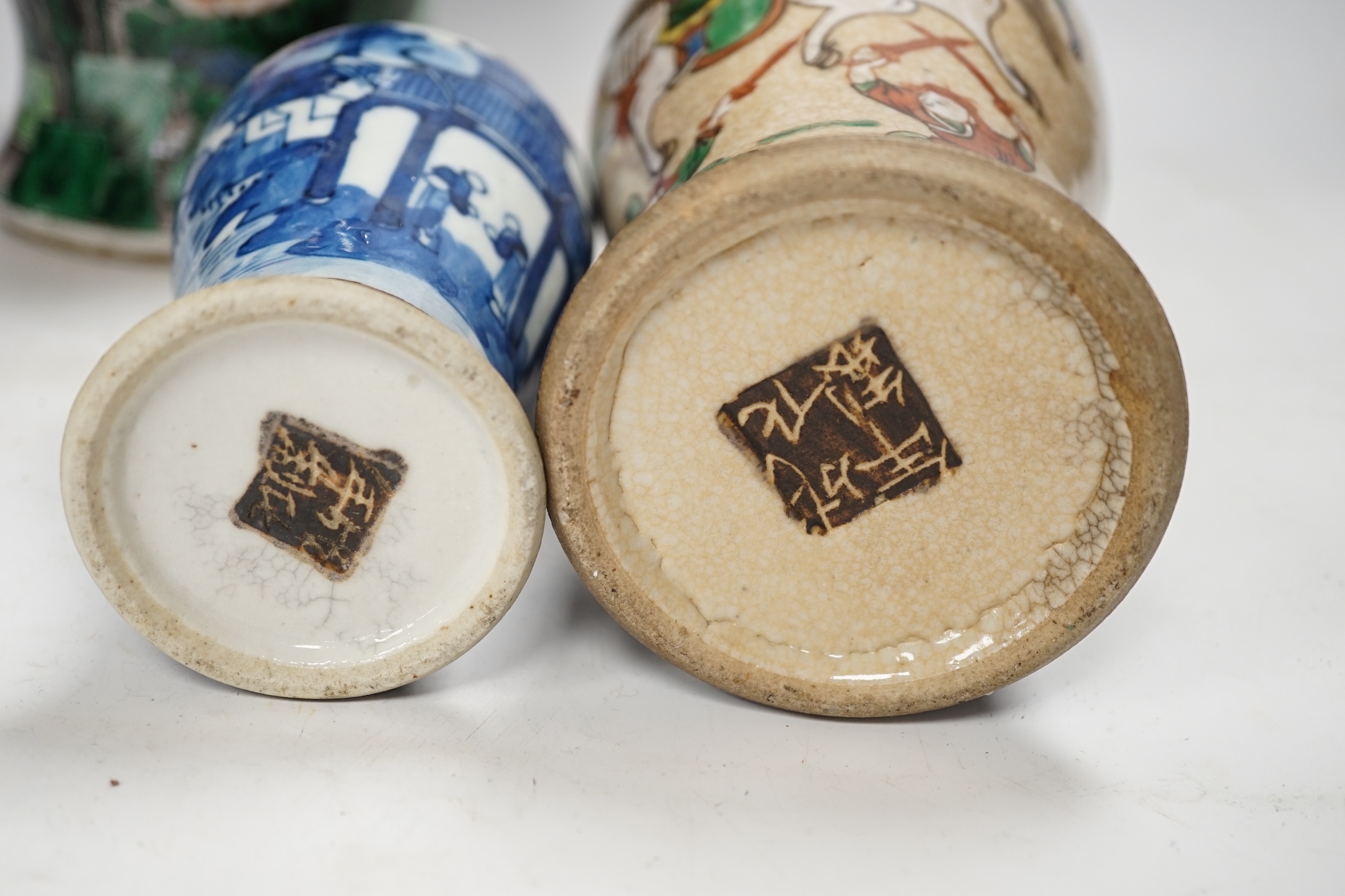 Three Chinese vases, 19th/early 20th century, including a cut down famille noire vase, crackleglaze and blue and white vases, tallest 34cm. Condition - fair to poor
